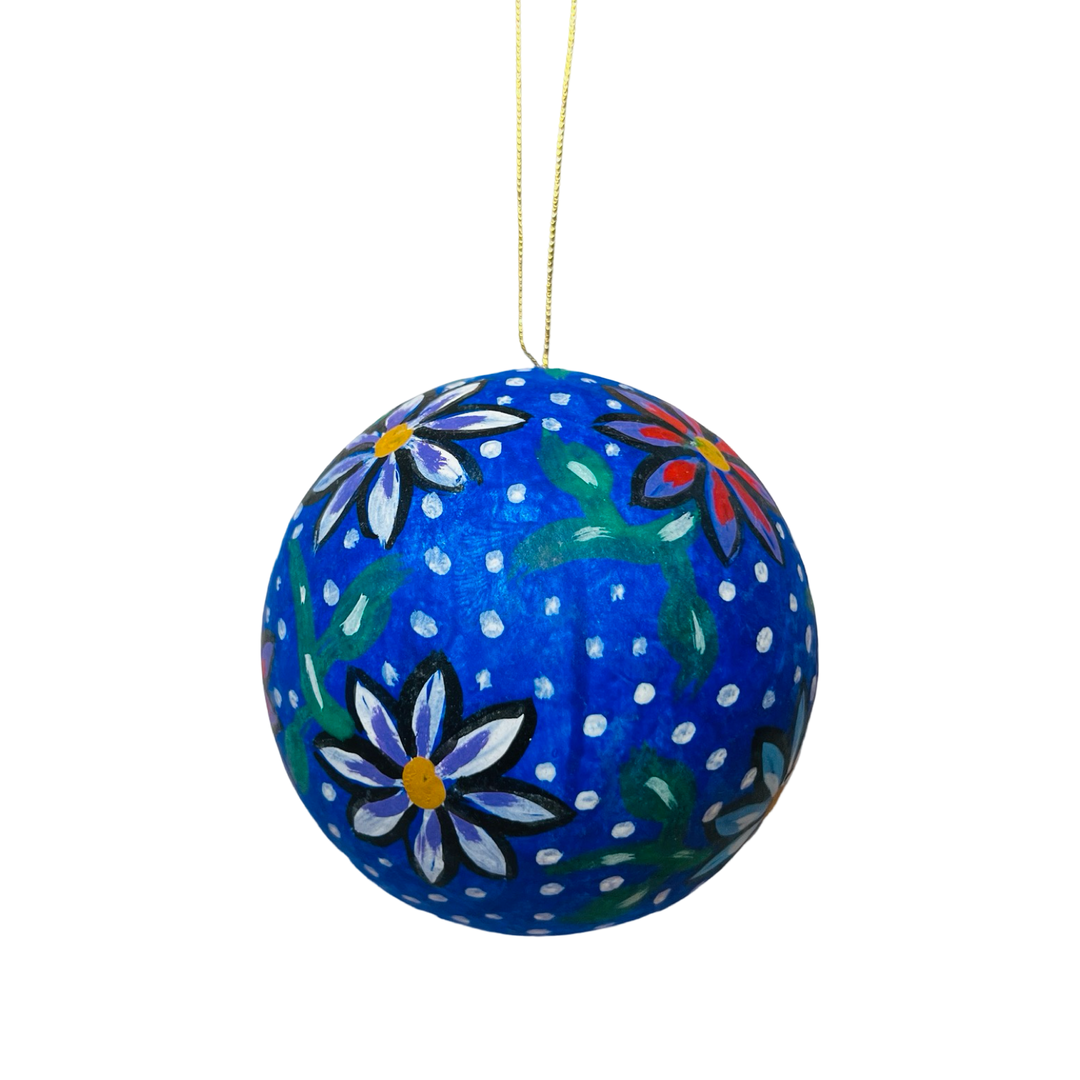 Hand-painted blue papier-mâché sphere ornament featuring colorful floral designs