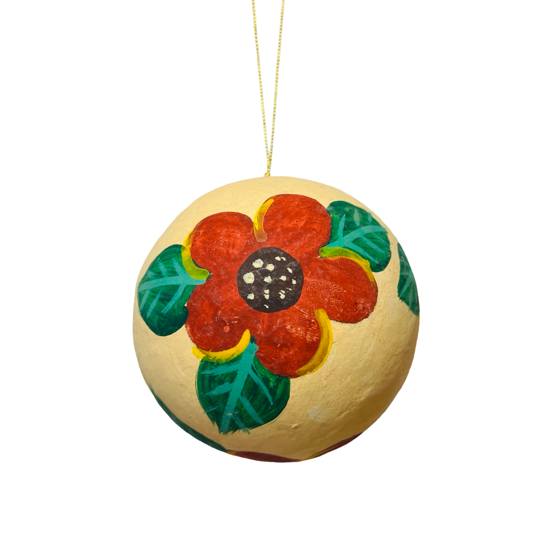 Hand-painted tan papier-mâché sphere ornament featuring red floral designs