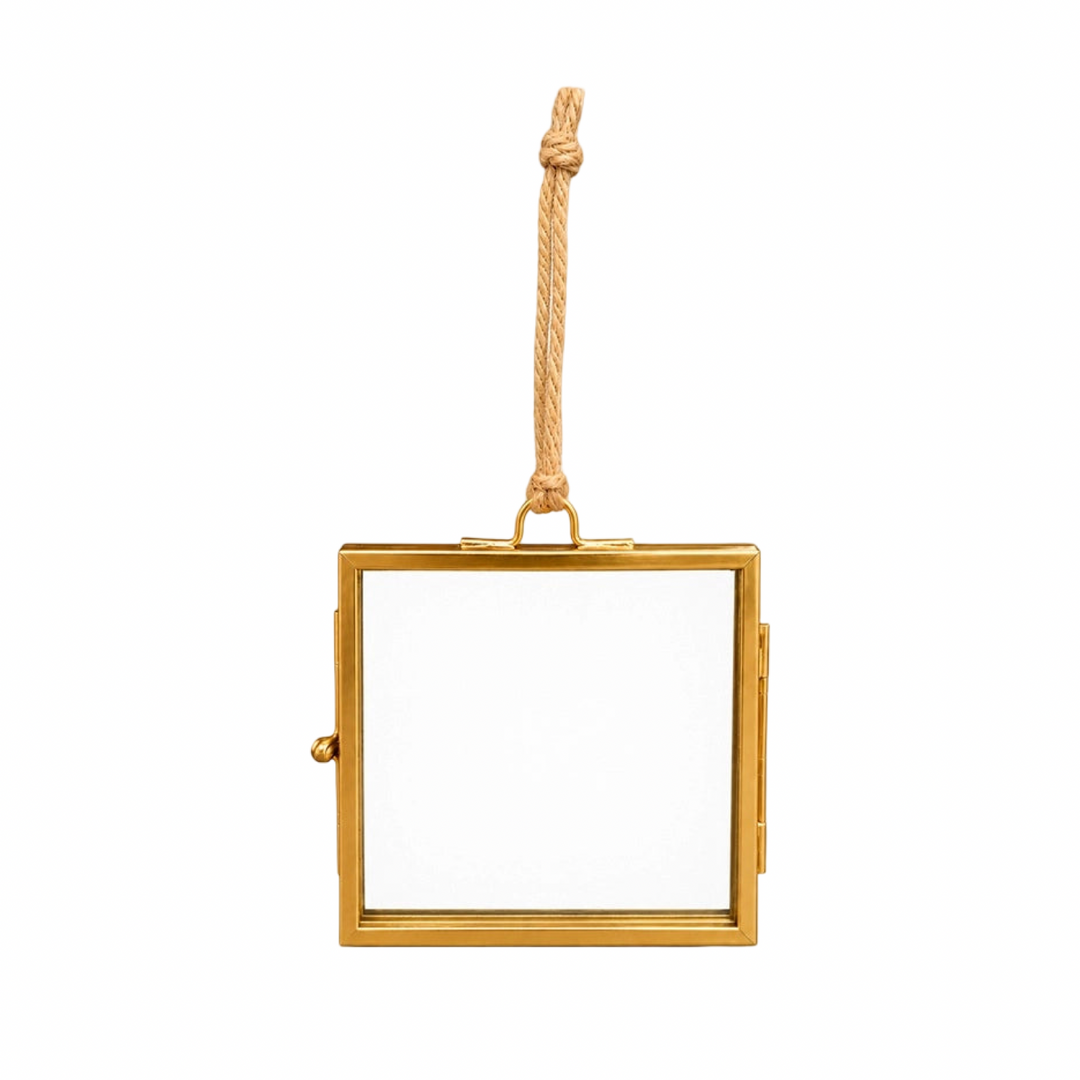 Gold glass keepsake frame ornament with a jute hanging cord.