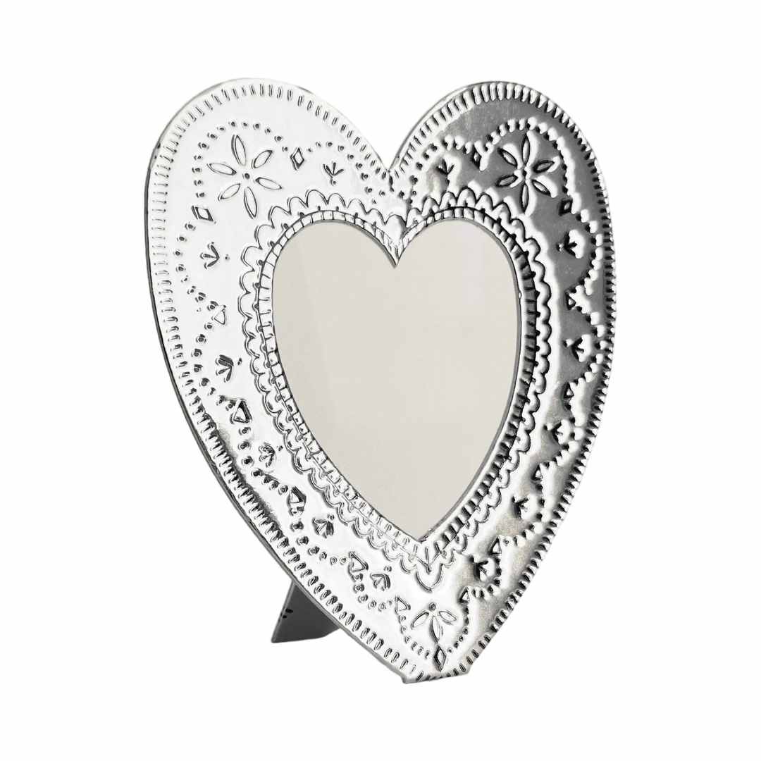 SIlver faux tin frame shaped like a heart 