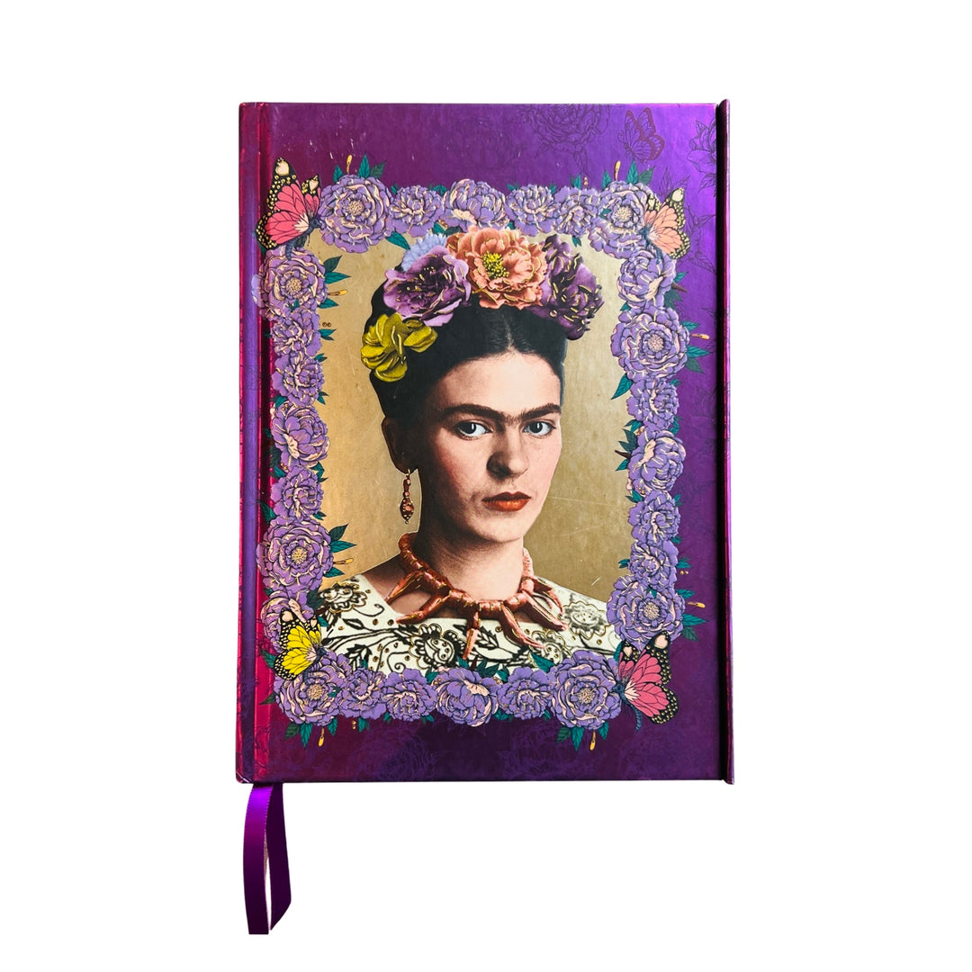 Purple hardcover journal with an image of Frida Kahlo surrounded by purple flowers and butterflies