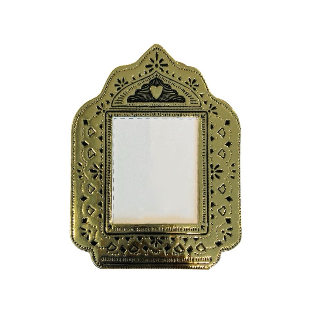 gold faux tin frame with a heart in the top center