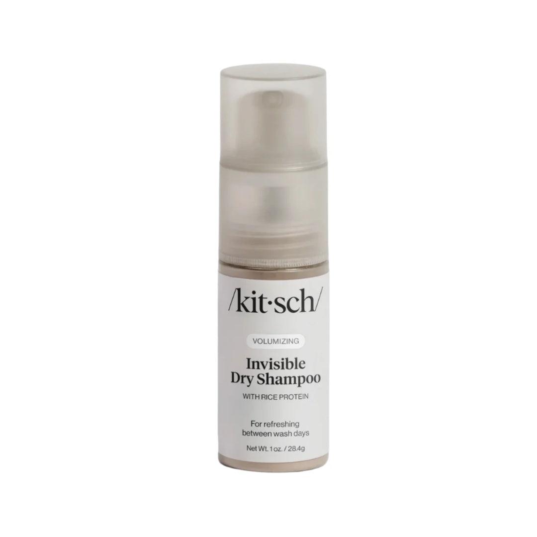 1 oz bottle of Kitsch Invisible Volumizing Dry Shampoo with a frosted spray cap and minimalist white label