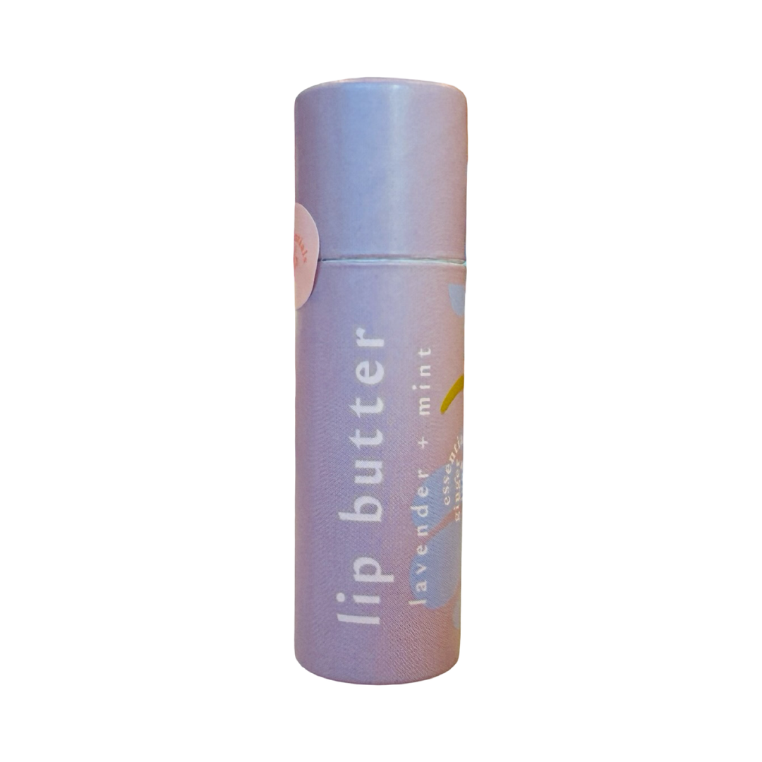 Lip butter tube labeled “lavender & mint” with a floral illustration.