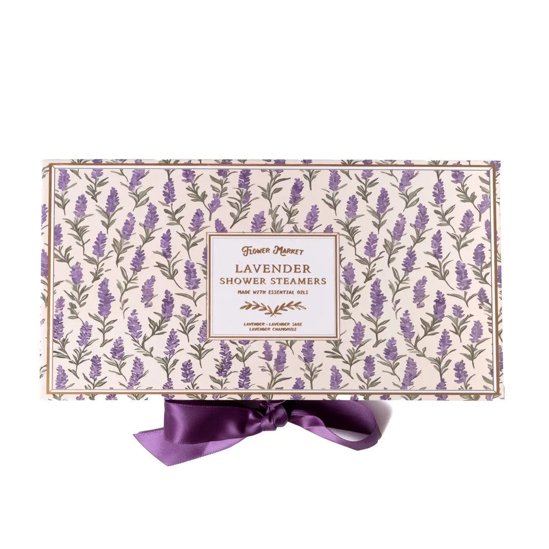 Lavender Shower Steamers gift box with a lavender sprig print and purple satin ribbon..