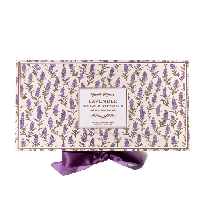 Lavender Shower Steamers gift box with a lavender sprig print and purple satin ribbon..