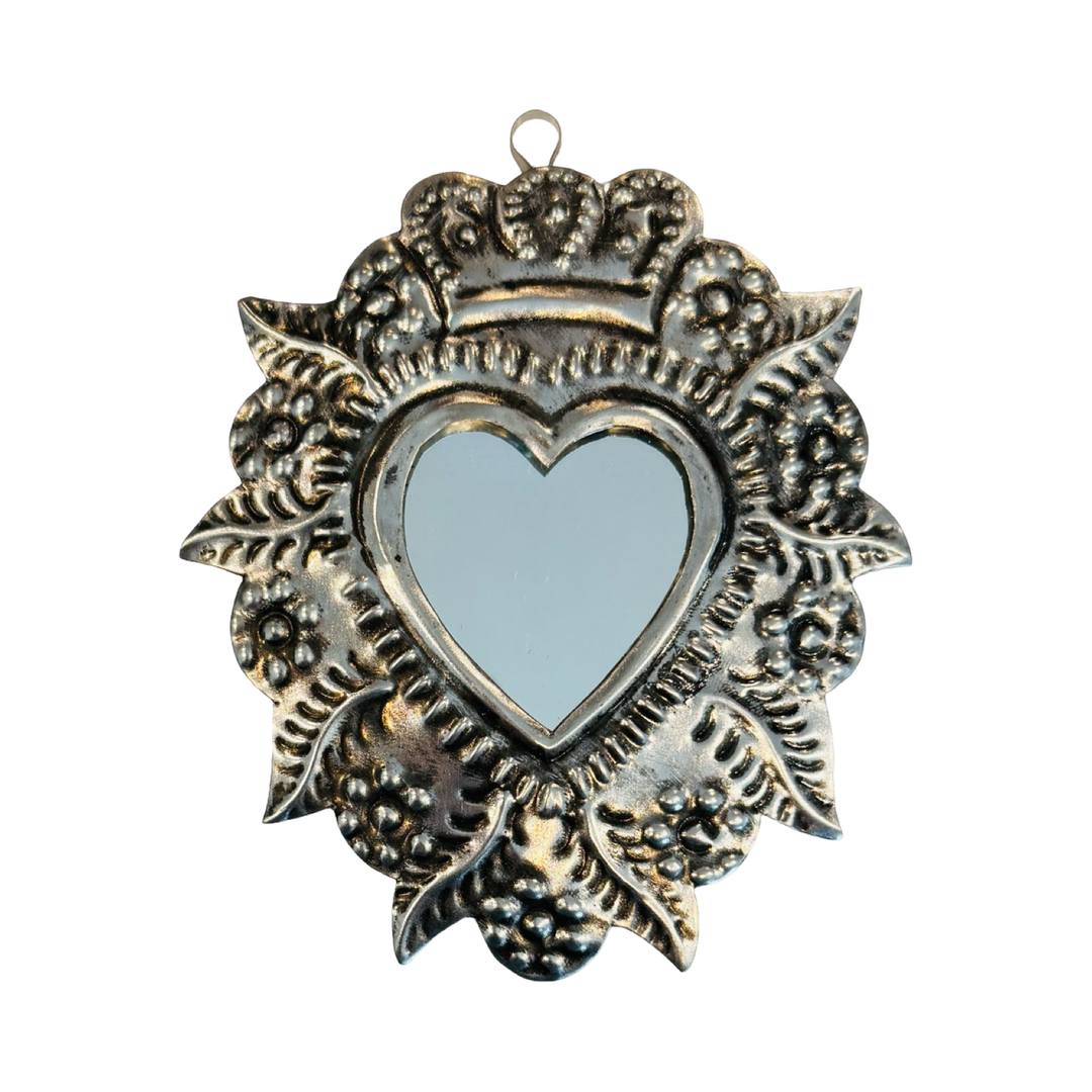 Decorative heart-shaped mirror with ornate frame