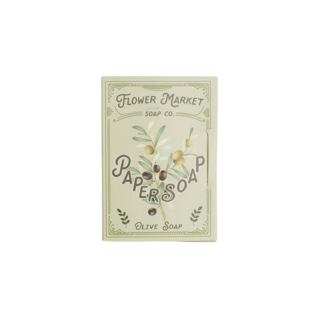 Packaging for Olive Oil Paper Soap with a design that includes olive leaves and olives, indicating the main ingredient olive oil.
