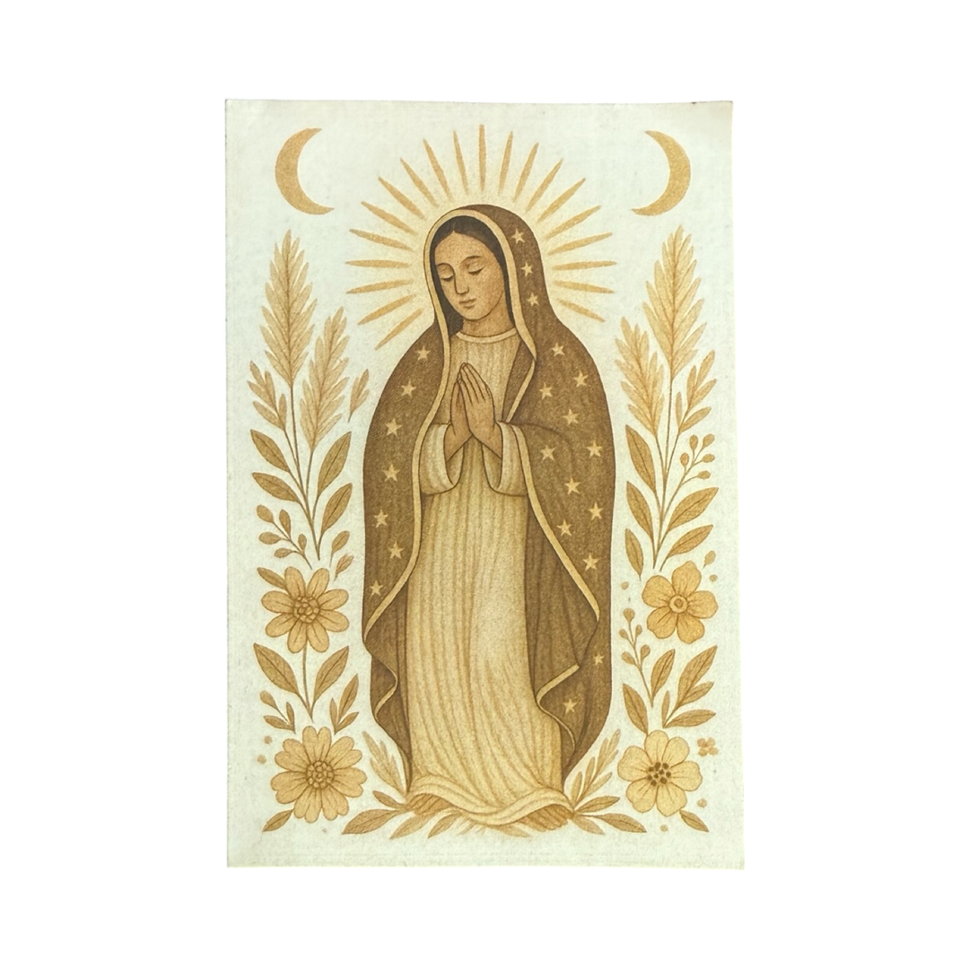 Sticker of Our Lady of Guadalupe in soft brown and beige tones, surrounded by flowers, leaves, radiant beams, and crescent moon.