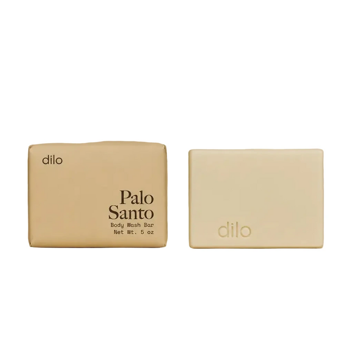 Dilo Palo Santo body wash bar with kraft paper packaging shown alongside the unwrapped soap bar.