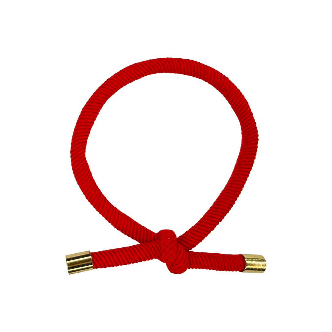 Red elastic hair cord with knot closure with metal end caps. 