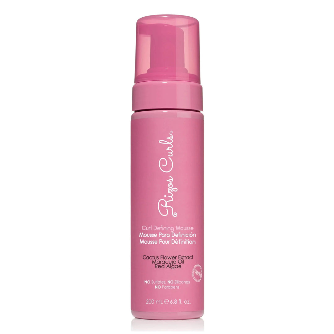 6.8 oz pink branded mousse bottle with white lettering. Brand: Rizos Curls