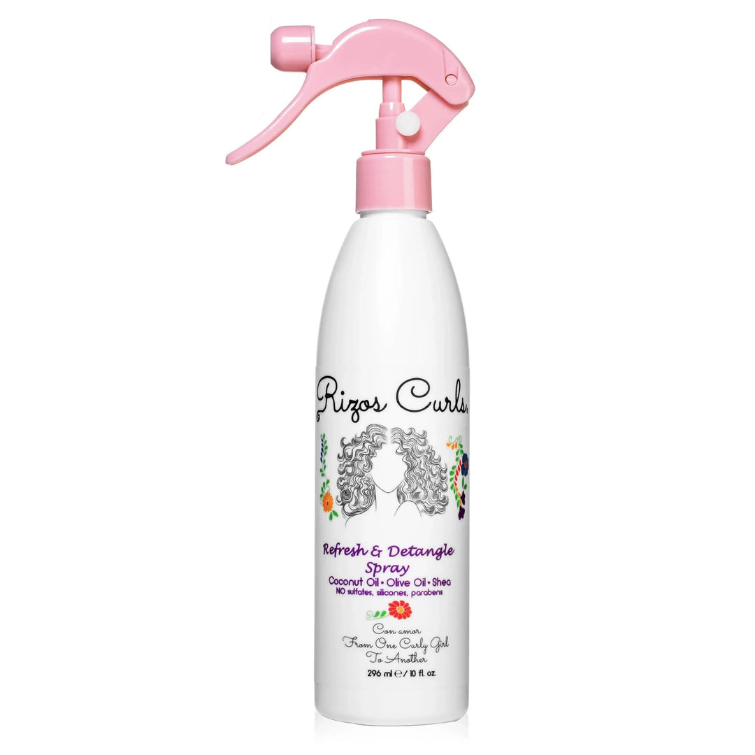 10 fl oz white branded spray bottle with a pink nozzle featuring an illustration of a woman with curly hair. Brand: Rizos Curls
