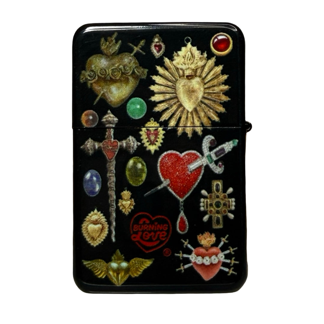 Sacred Heart lighter with a collage-style design featuring religious heart motifs and symbols.