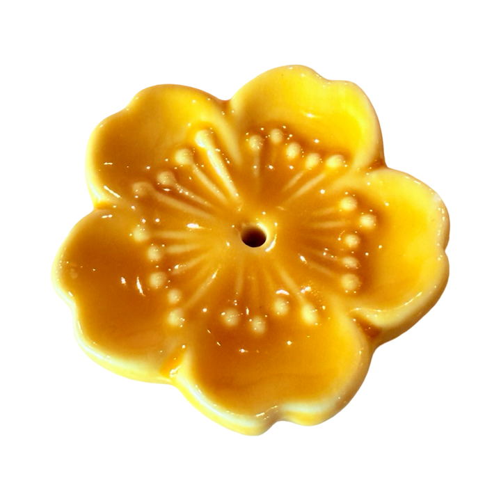 Golden yellow cherry blossom incense holder.