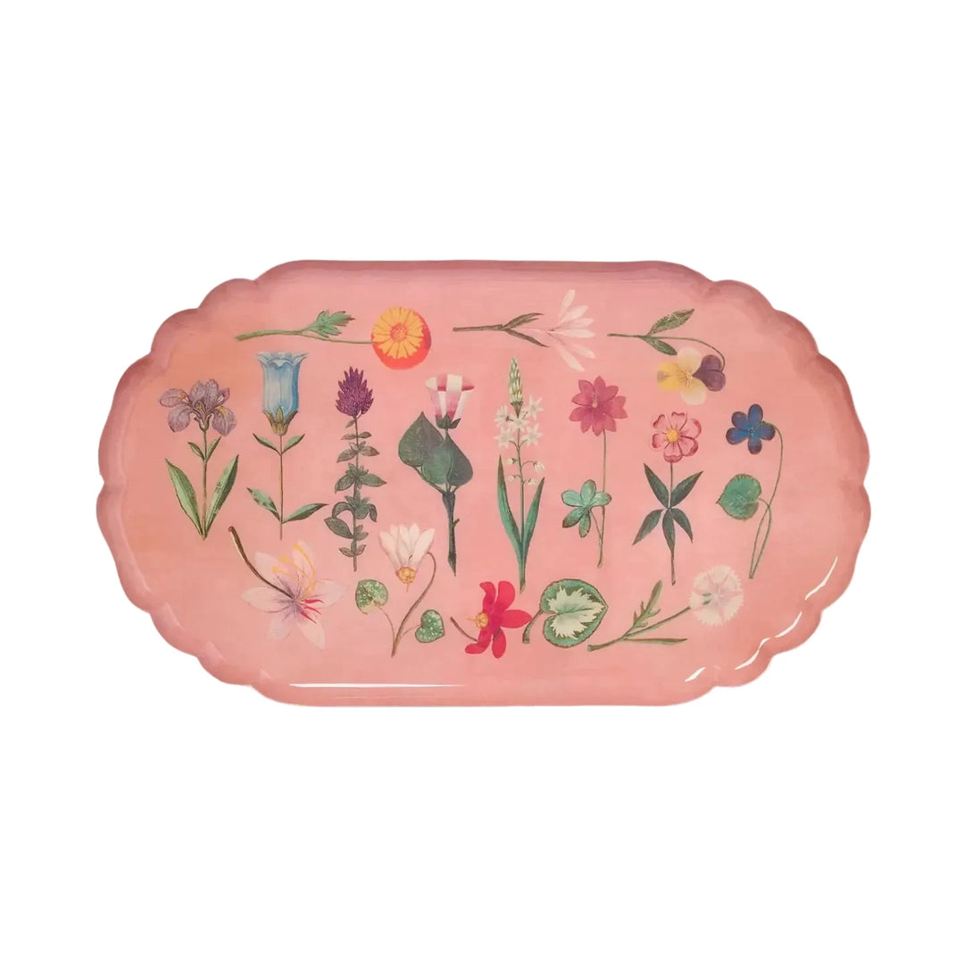 Scalloped peach colored enamel tray with assorted illustrated flowers and plants