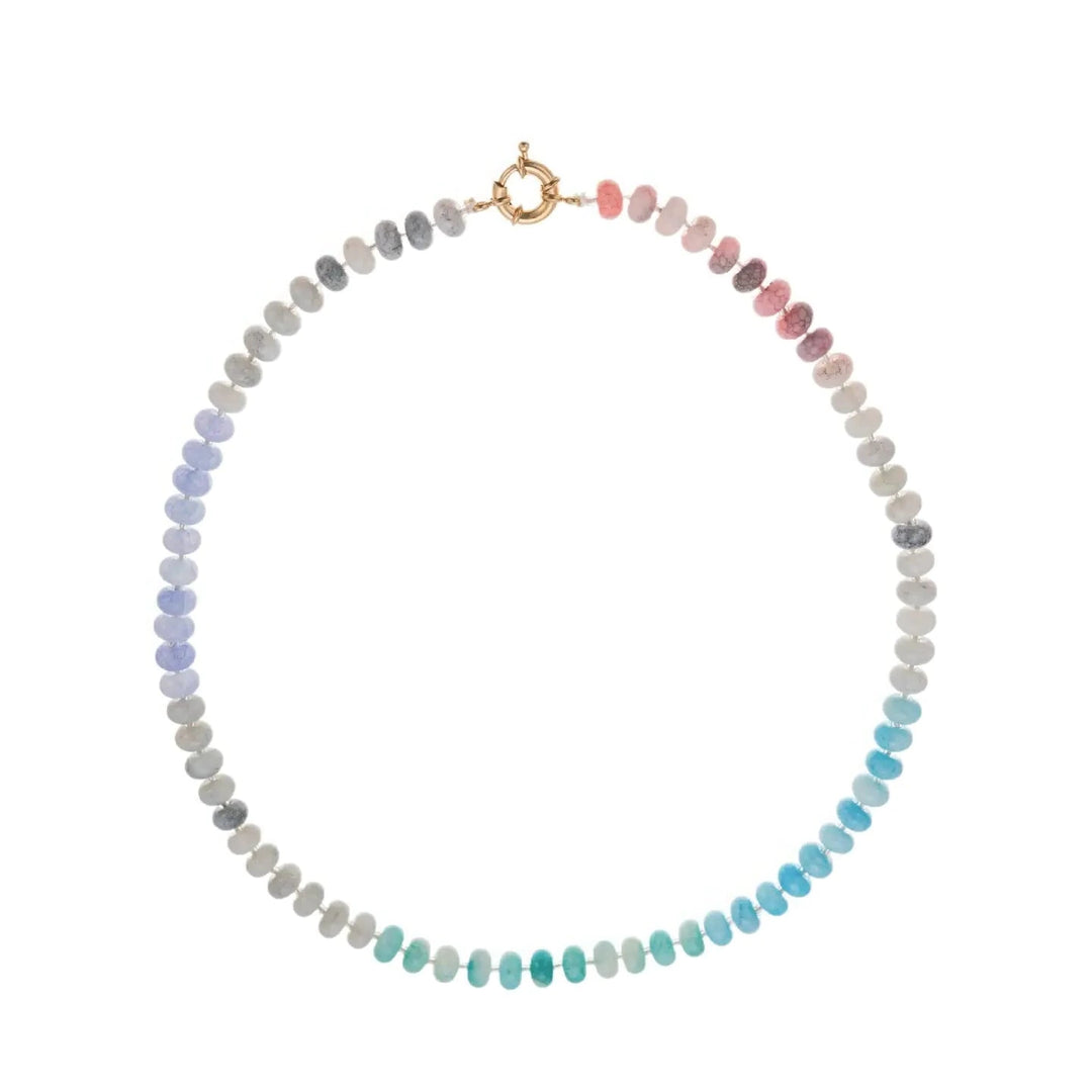 A semi-precious glass bead necklace in a gradient of teal, blue, lavender, gray, and blush tones with a gold spring ring clasp.