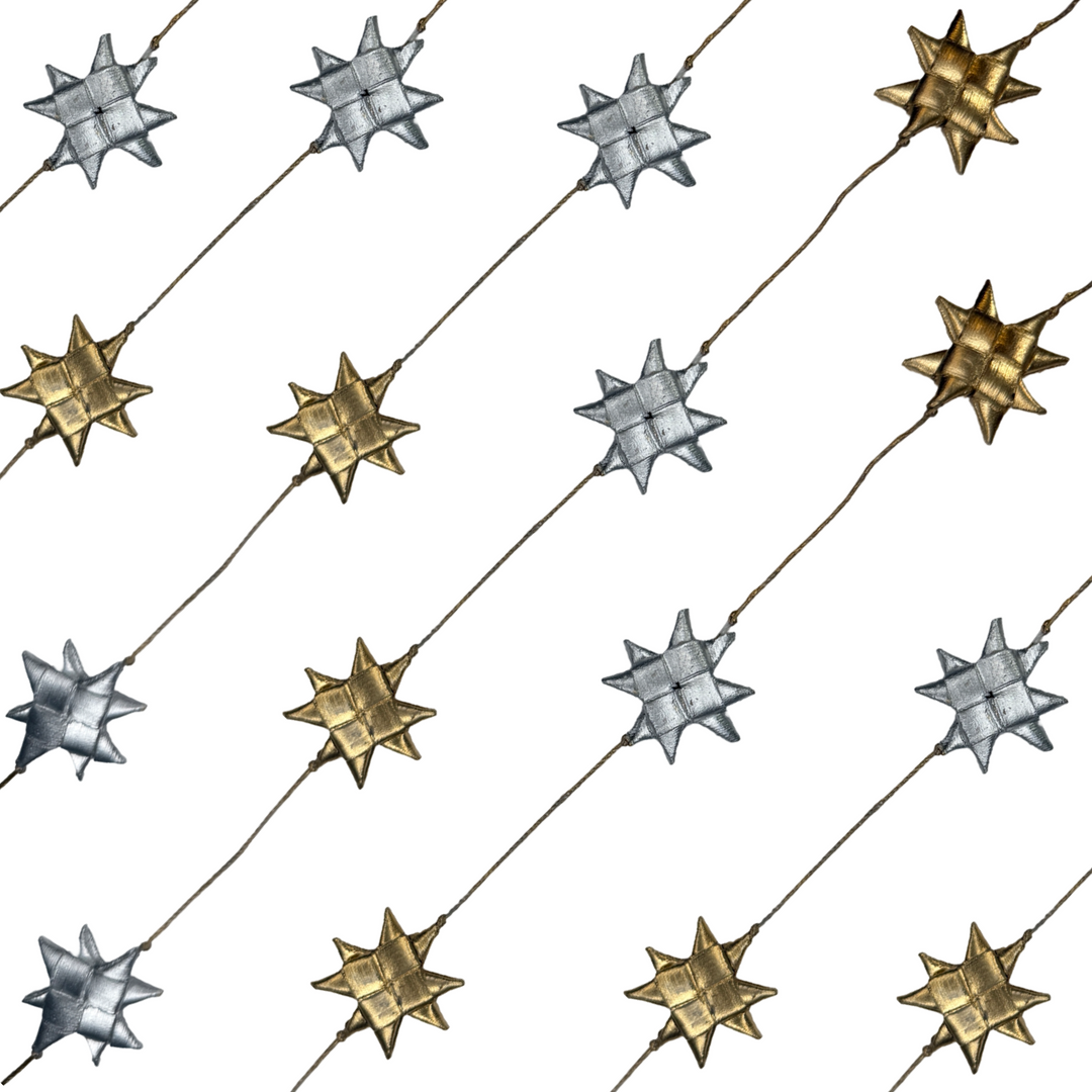 Garland with alternating metallic silver and gold stars attached to a thin cord.