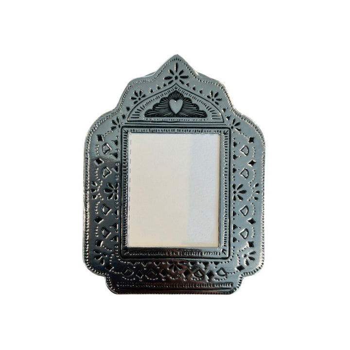 silver faux tin frame featuring a heart on the top center