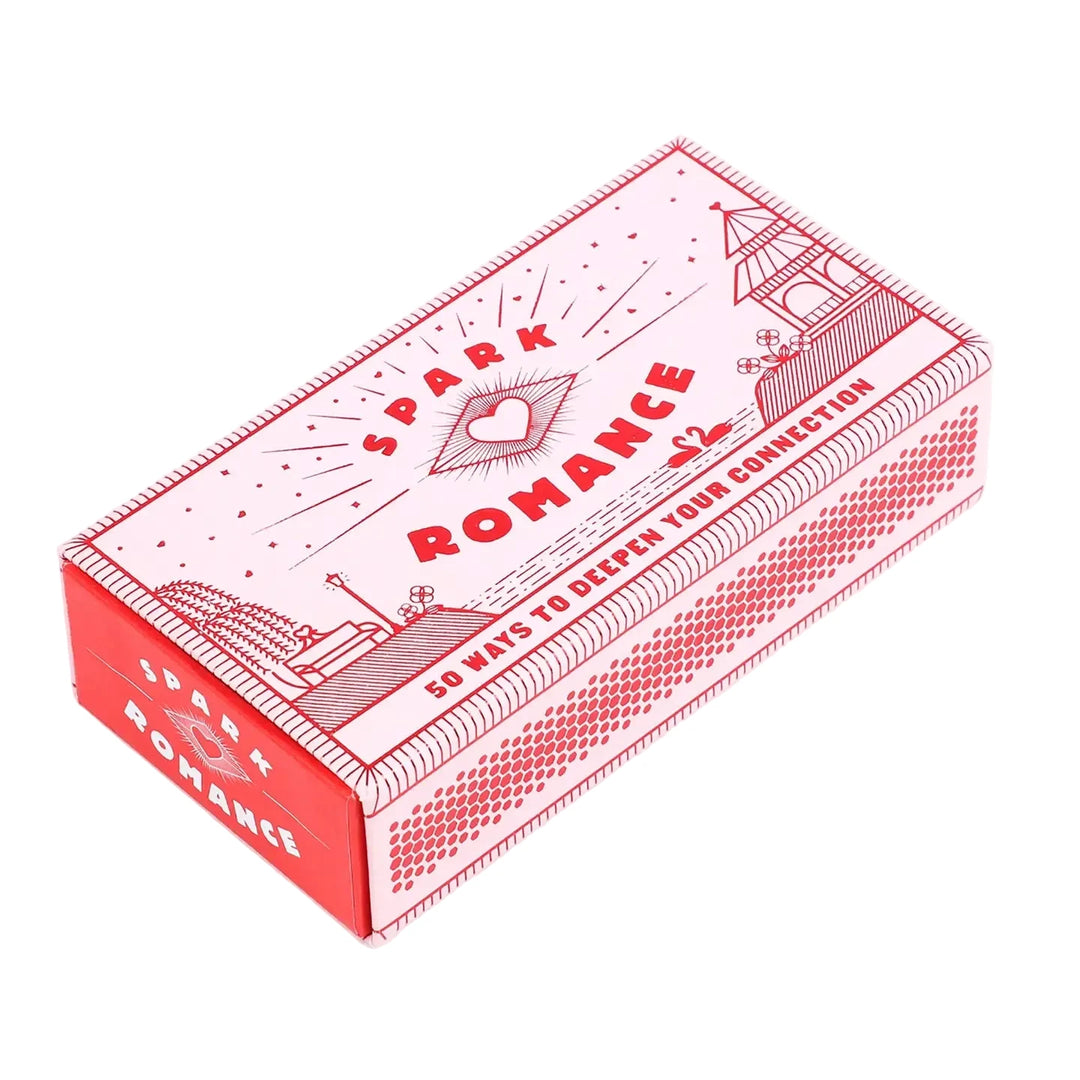 Box of romance-themed prompt sticks with individual sticks displaying written activities for couples.