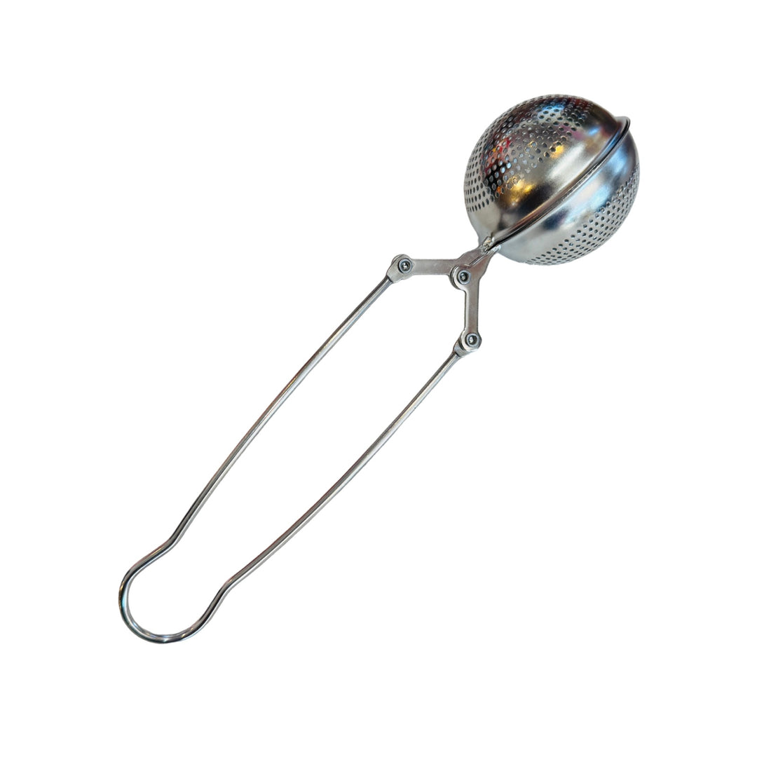 silver round tea infuser with a handle