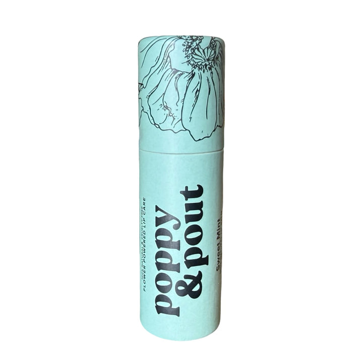 Sage Tube of lip balm labeled “poppy & pout."
