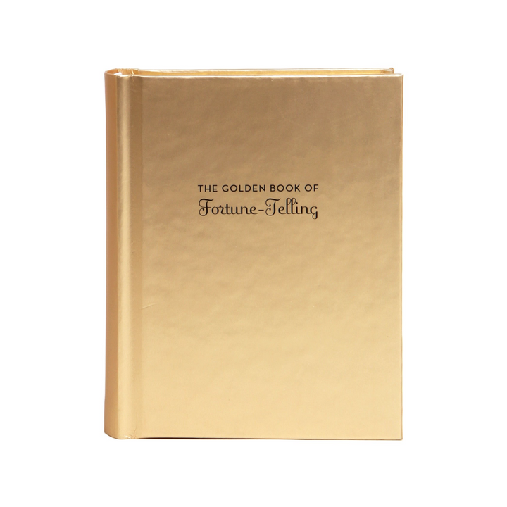 Gold book titled 'The Golden Book of Fortune-Telling' features a soft gold metallic cover with small black title text.