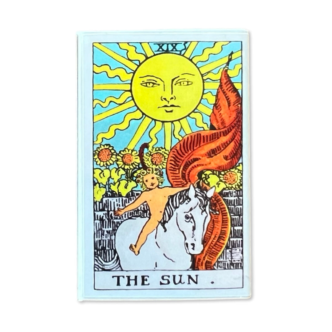 box of matches with an image of the sun tarot card