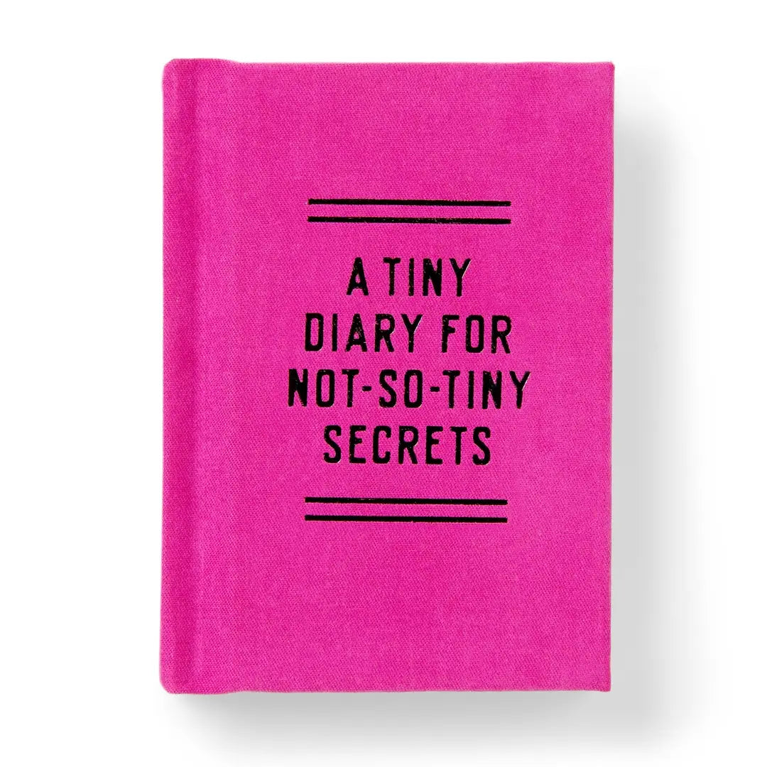 A small hot pink hardcover diary with bold black text reading A Tiny Diary for Not So Tiny Secrets.