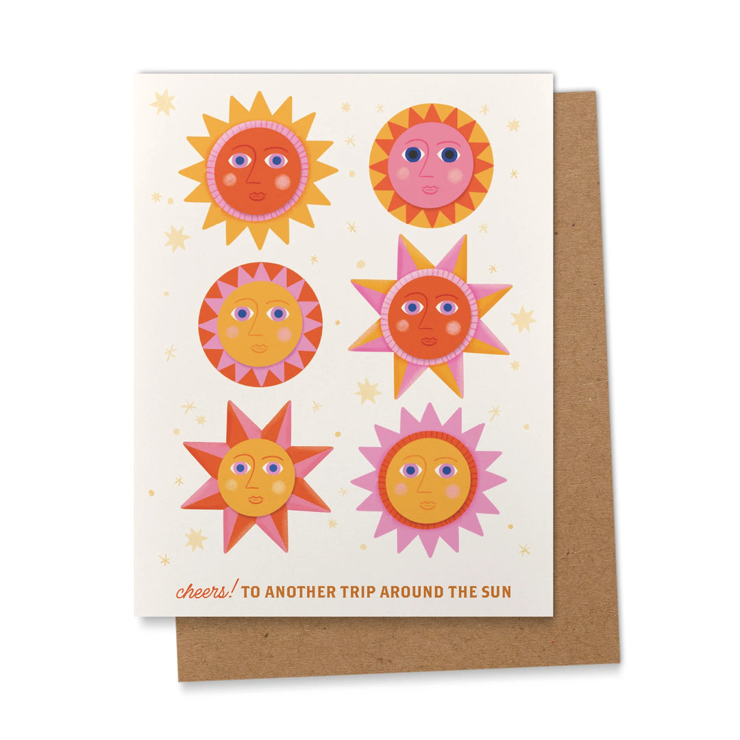 Greeting card with sun designs and a brown envelope 