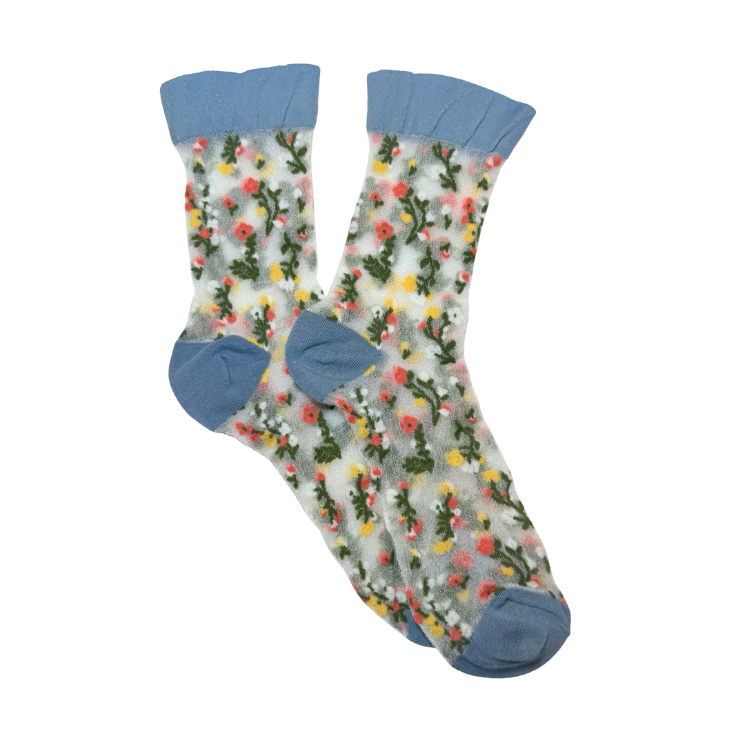 pair of mesh socks with a colorful floral design and navy blue cuff, heel and toe.