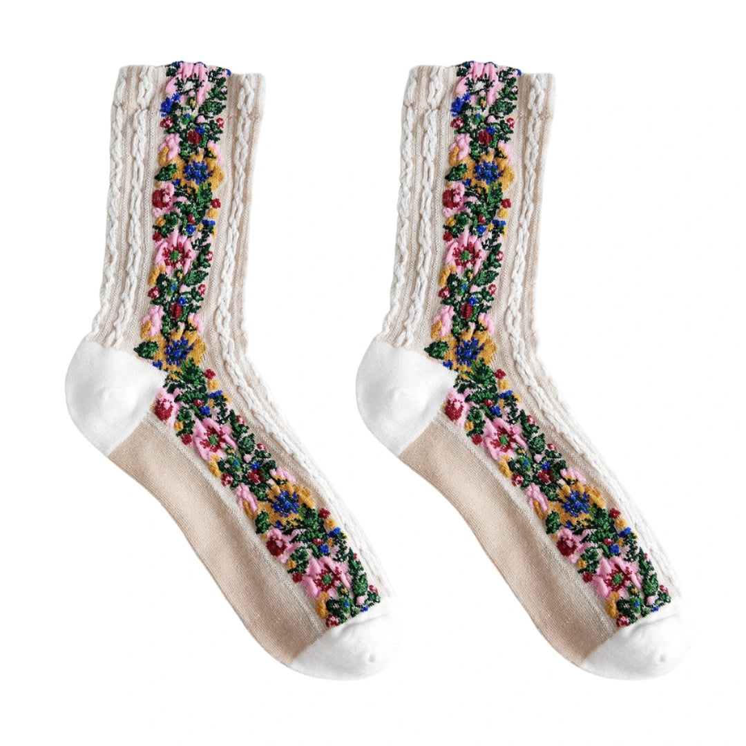 Pair of summer socks with colorful floral print and lace-style trim, featuring soft white toes and cuffs.