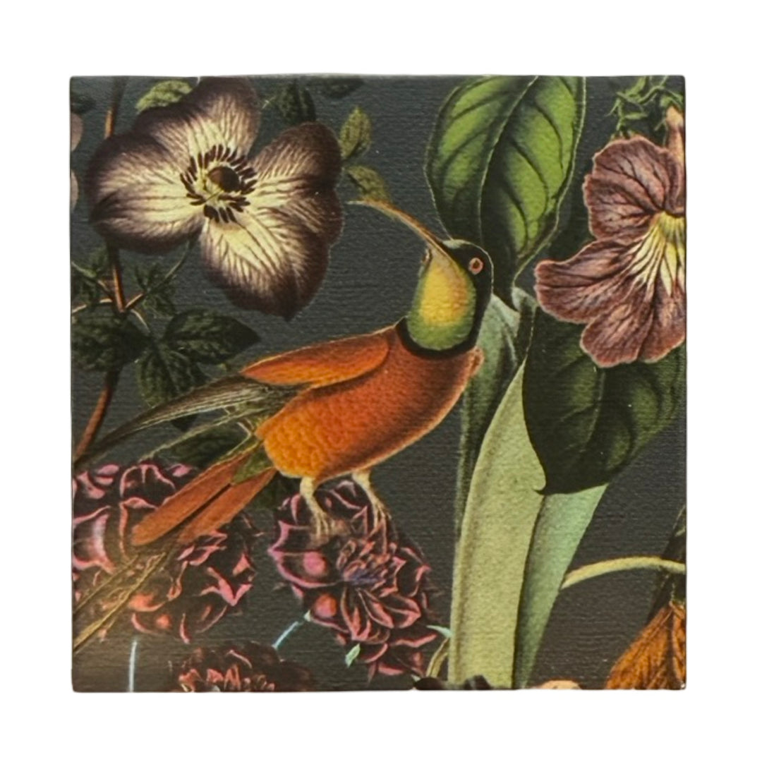 Dark green square matchbook featuring a single orange hummingbird perched on a branch surrounded by purple, green and pink flowers.