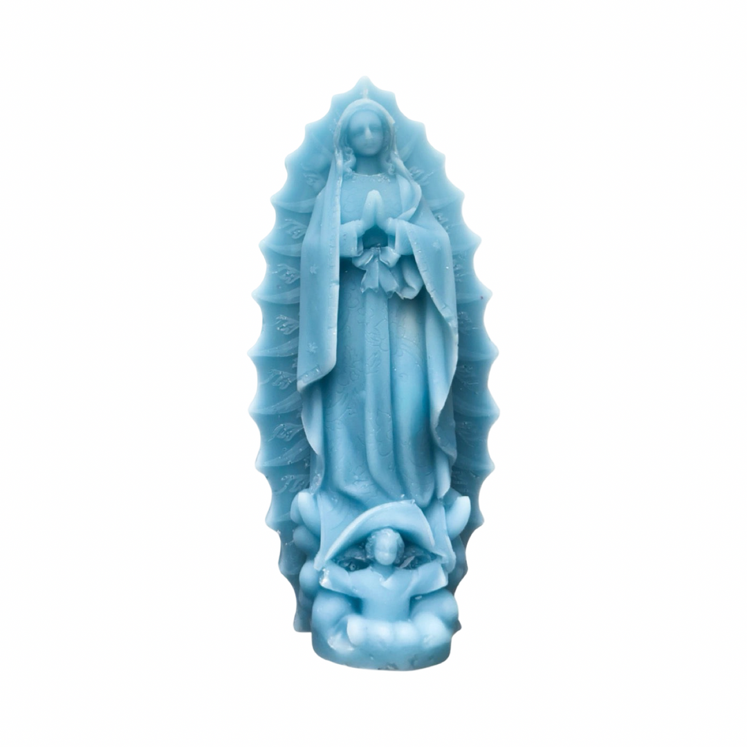 Light blue embossed Virgen de Guadalupe figural candle with detailed relief and decorative halo.