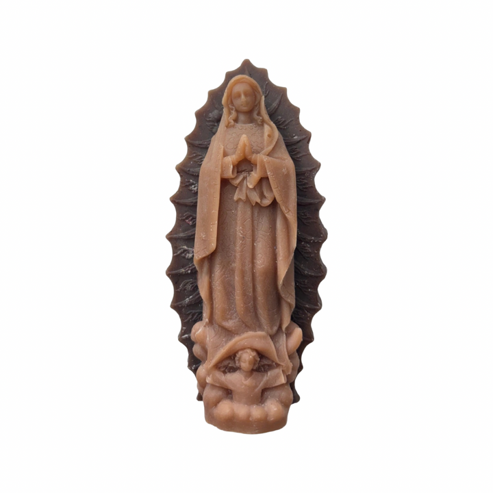 Brown embossed Virgen de Guadalupe figural candle with detailed relief and decorative halo.