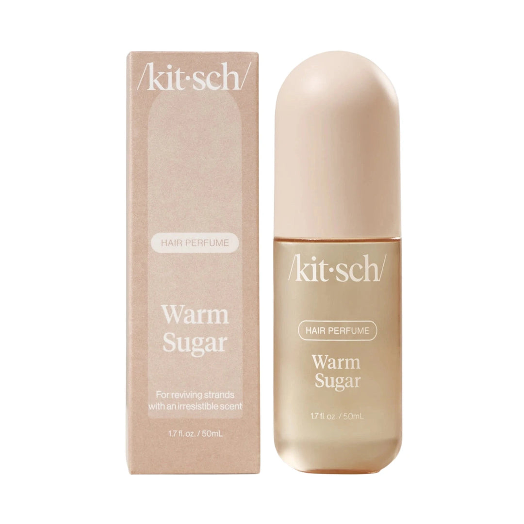 Beige box and frosted spray bottle labeled “Kitsch Warm Sugar Hair Perfume