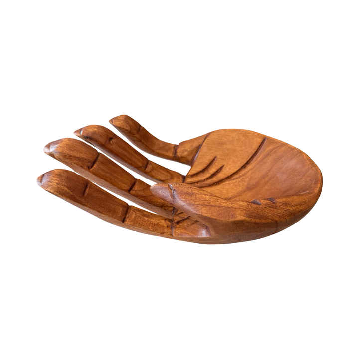 Side view of an open wooden hand.