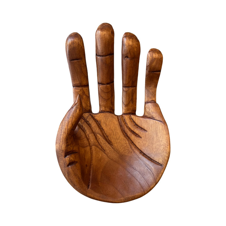 Top view of a carved open wooden hand.