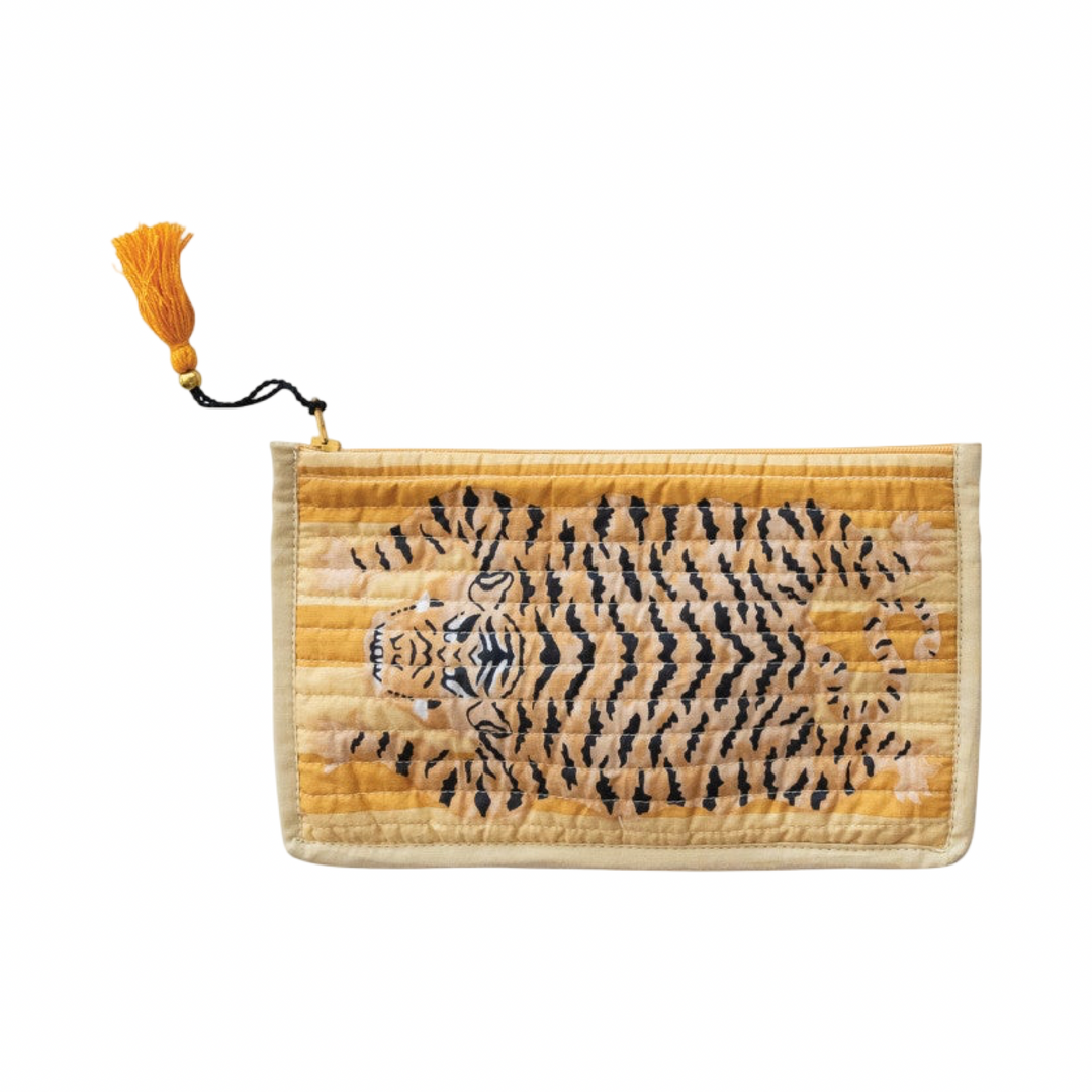Yellow quilted zip pouches with a tiger print and tassel zipper pulls.