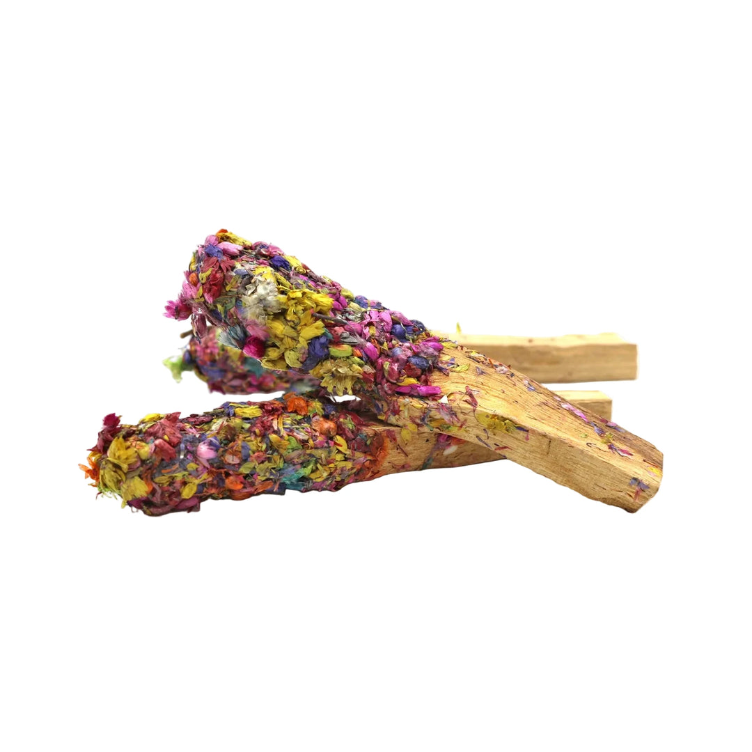 Palo Santo sticks dipped in colorful dried flower petals.