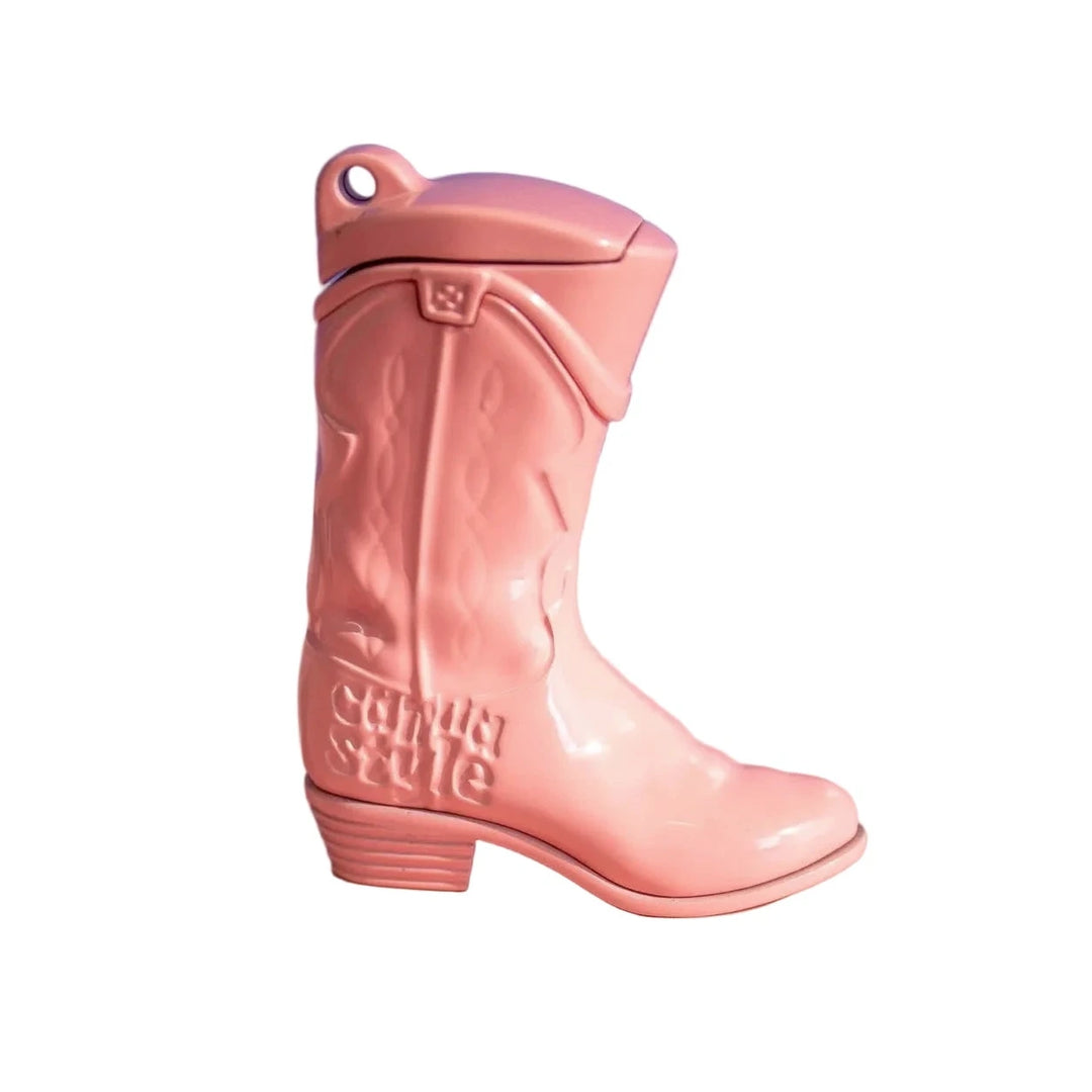 Pink cowboy boot shaped lighter with embossed Western stitching, a flip top cap, and a key ring loop.