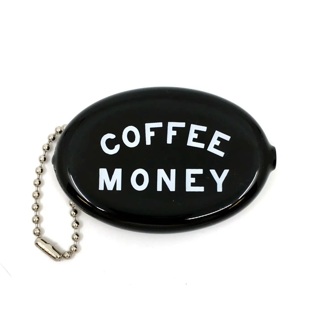 A black oval coin pouch with the words "COFFEE MONEY" in bold white letters, attached to a silver ball chain.