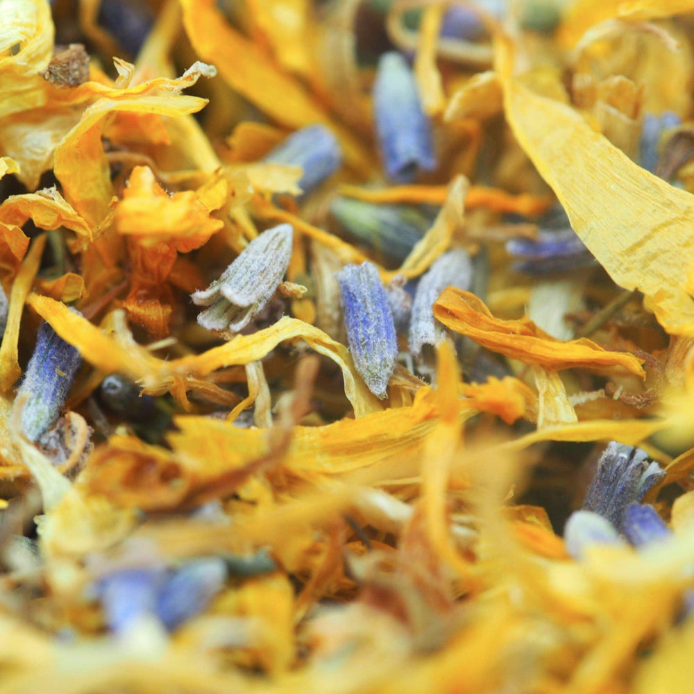 close up view of dried lavender and calendula flowers. Brand: Loveyenergy & Blessings