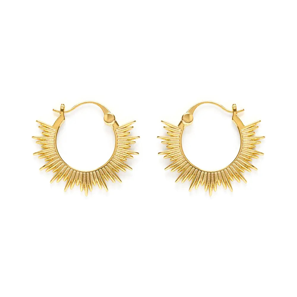 Gold hoop earrings with sunburst-style rays extending outward, shown on a white background.