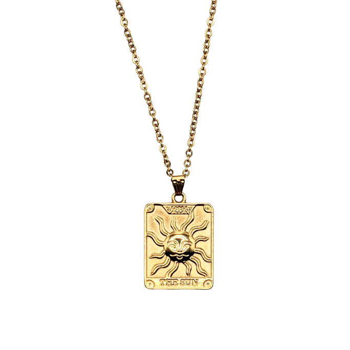 gold necklace with a tarot card with an image of the sun pendant