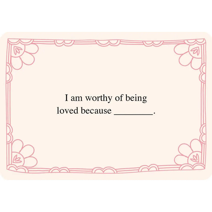 A writing prompt card with a floral border, featuring the prompt: "I am worthy of being loved because _______." The card is designed for self-reflection and personal growth.