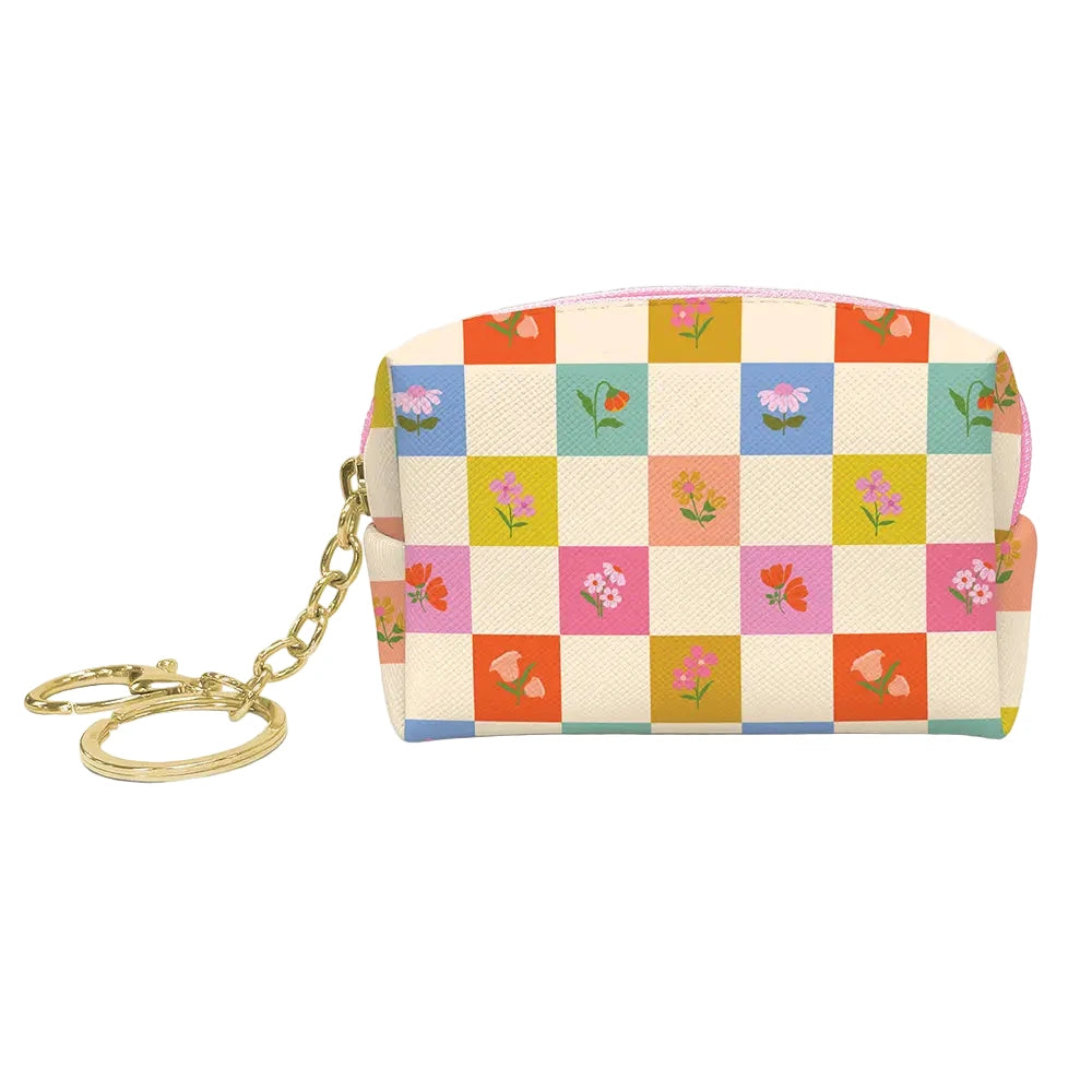 Small zippered key chain pouch with a colorful checkerboard floral pattern, shown with a gold key ring and clip attached.