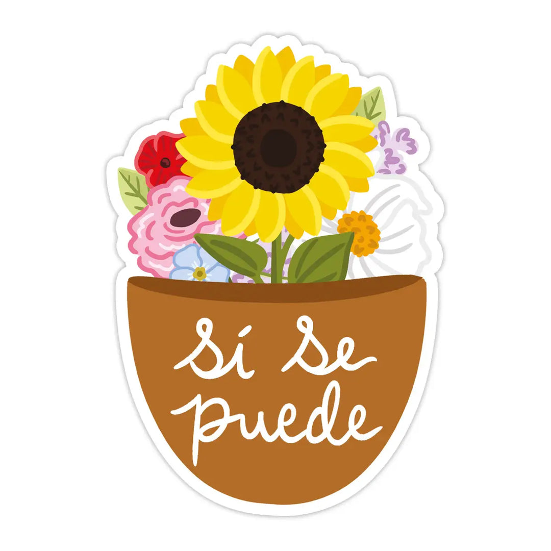 A sticker with an illustration of a sunflower in a brown terracotta pot, surrounded by various colorful flowers. The pot features the phrase "Sí Se Puede" in white cursive text.