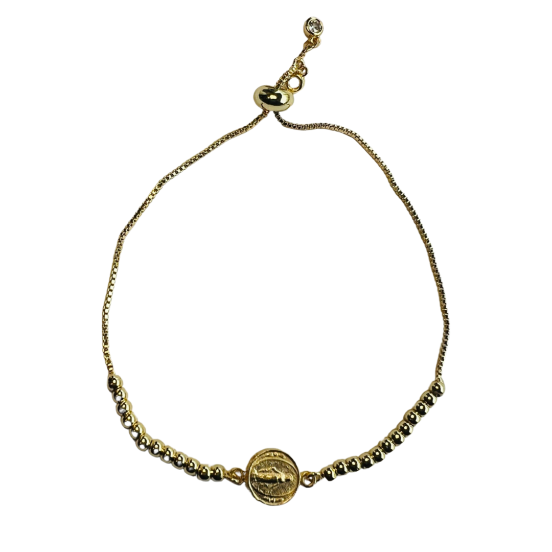 Gold beaded bracelet with a VIrgin Mary Medallion