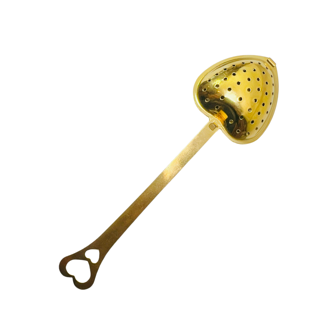 gold heart shaped spoon tea infuser. Brand: Loveyenergy & Blessings